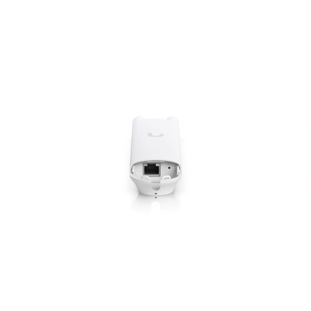 Vista trasera del dispositivo blanco mostrando puerto Ethernet Gigabit RJ45 y botón de reinicio
