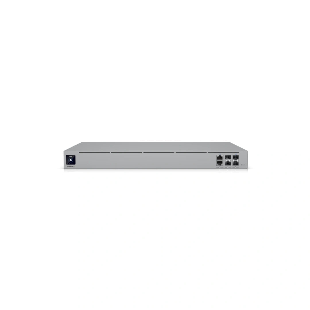 Dispositivo firewall empresarial Ubiquiti plateado con carcasa metálica, botones de control y múltiples interfaces de red de