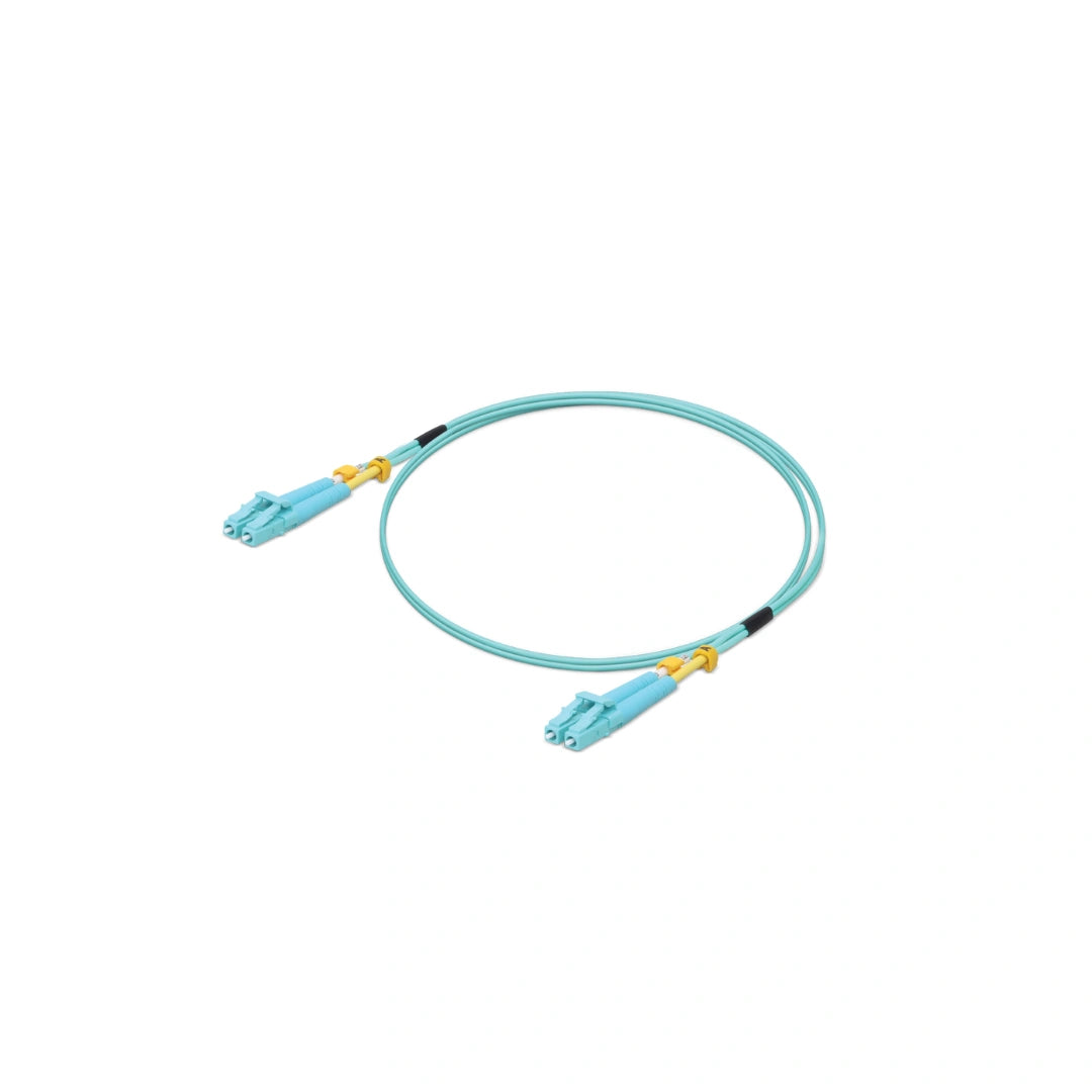 Bobina circular cable red UniFi fibra óptica con conectores LC detalles amarillos y bandas negras
