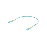 Vista extendida cable fibra óptica duplex azul con boots de tensión amarillos y marcadores negros