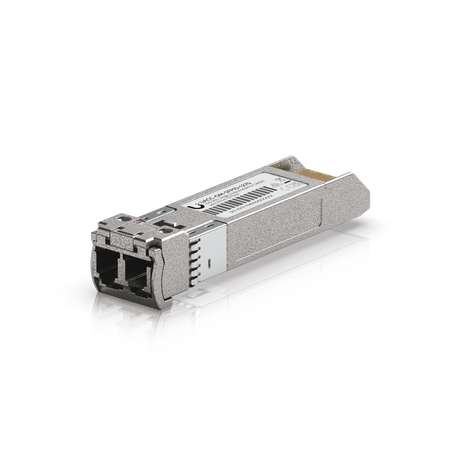 Módulo óptico SFP+ gris metálico con conector LC dúplex y etiqueta blanca sobre fondo blanco