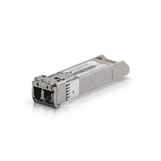 Módulo transceptor SFP+ UniFi plateado con conectores LC y contactos dorados sobre fondo blanco