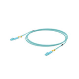 Cable de salto fibra óptica OM3 azul claro con conectores LC y protectores amarillos