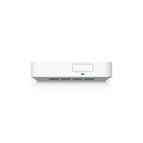 Perspectiva trasera del router con ranuras de ventilación horizontales y panel empotrado con indicador LED verde