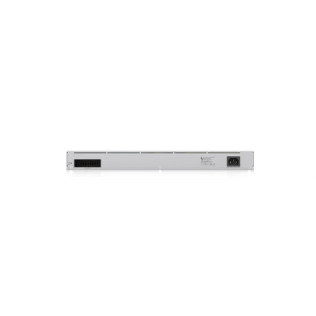 Panel trasero del router UniFi con puerto de expansión, texto regulatorio y toma de corriente IEC