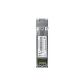 Módulo SFP+ gris de Ubiquiti visto desde arriba con etiqueta blanca y contactos dorados