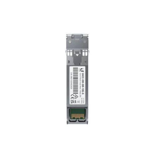 Módulo SFP+ gris de Ubiquiti visto desde arriba con etiqueta blanca y contactos dorados