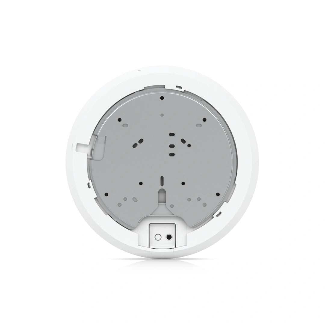Placa de montaje interna blanca con carcasa gris circular y puertos de conexión