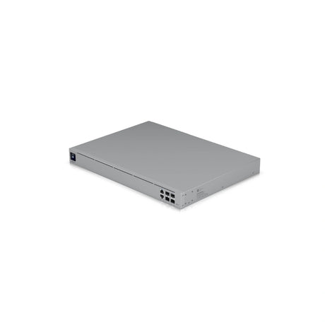 Vista superior de firewall Ubiquiti UniFi plateado con puertos SFP y RJ45 visibles en el lateral derecho sobre fondo blanco