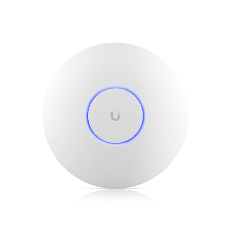 Punto de acceso Ubiquiti UniFi blanco circular con anillo LED azul iluminado y logotipo gris central sobre superficie mate.