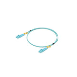 Bobina circular cable red UniFi fibra óptica con conectores LC detalles amarillos y bandas negras